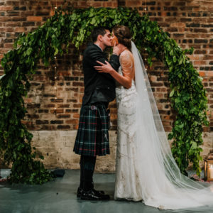 Moon Arch Ceremony Foliage Wedding Flowers